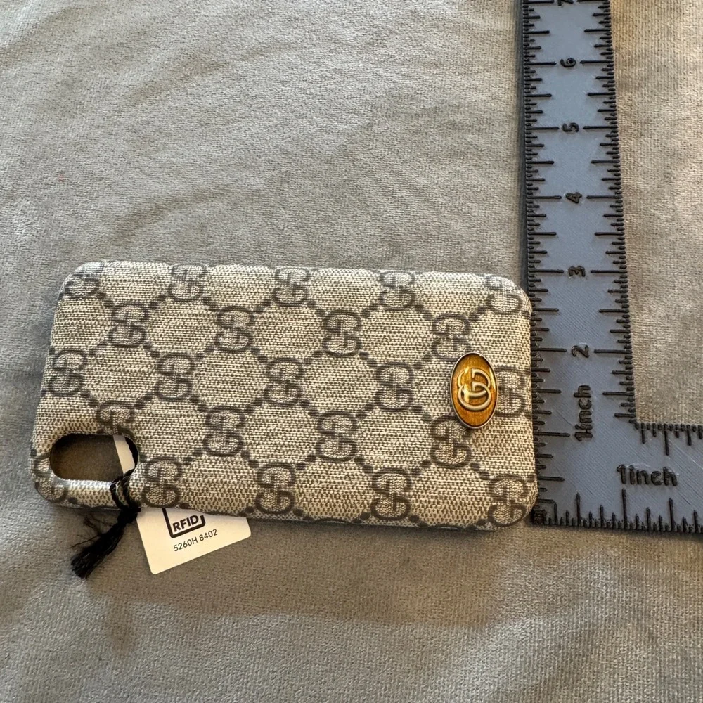 Gucci gold features case
